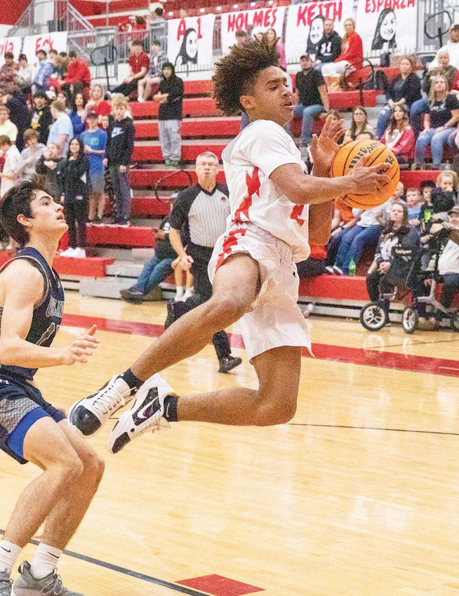 Purcell freshman Kobe Freeman flies down the lane Monday night during the Dragons&rsquo; 54-49 win over No. 4 ranked Marlow. Freeman scored nine points.