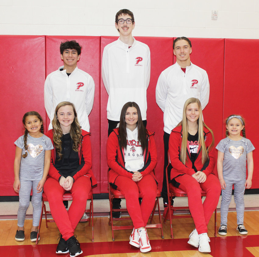 Jaiden Avila, seated center, will take the crown as Purcell&rsquo;s basketball homecoming queen during a coronation ceremony Friday. Flanking her, from left, are attendants Kynndra Willis Lauren Holmes, KK Eck and Kyeerrah Willis. King candidates from left are Adolfo Vasquez, Cooper Hall and Nate Willis.