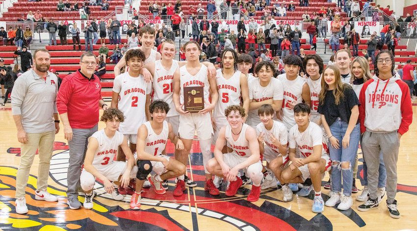 The Purcell Dragons won the District basketball tournament with a 61-47 win over Christian Heritage Academy at the Reimer Center. See story on page 2B.