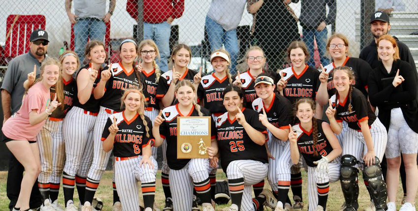 The Wayne Lady Bulldogs beat Vanoss twice on Tuesday, 14-13 and 21-11, to claim the conference tournament championship. Those wins brough their season record to 15-0. Picture in front, from left, is Haiden Parker, Shyleigh Mantooth, Mayce Trejo, Daliyah Fuentes, Haylee Durrence and Allison Ryan. In back, from left, is coach Charles Durrence, Emily Woody, Kylie Gish, Jordyn Debaets, Faith Brazell, Addison Keeler, Bryston Shephard, Madi Sharp, Ashley Hayles, Kaylee Madden, Zoe Overley, and assistant coach Jackson Embry.