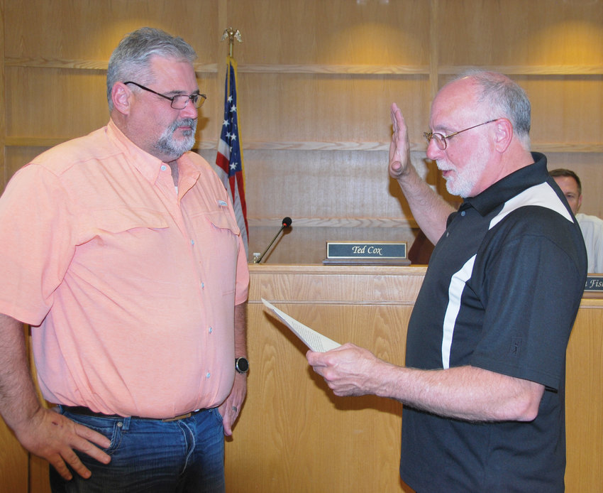 Newly elected Purcell City Councilman Allen Eubanks was sworn in by Mayor Ted Cox for a term on the board Monday night during a special meeting at the Purcell Police Service Building.