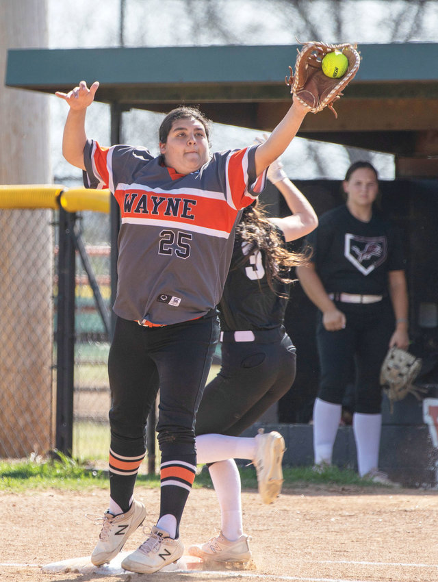 Wayne senior Mayce Trejo stretches for the ball for an out at first base. The Bulldogs, now 22-1, host Elmore City and Crescent in Districts today (Thursday).