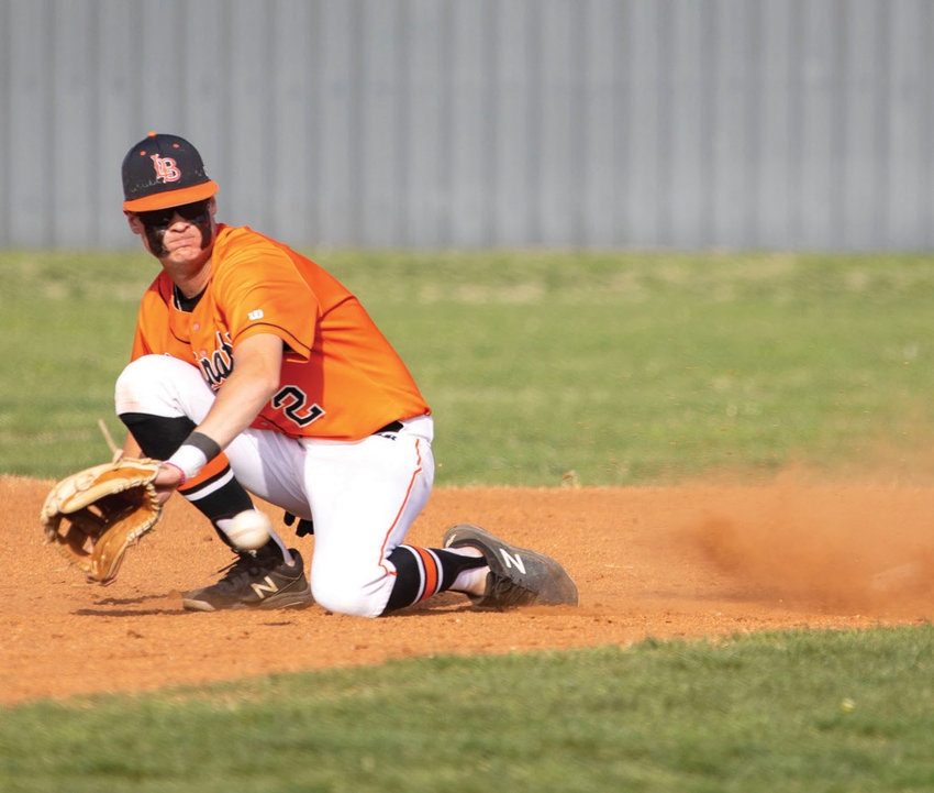 Lexington sophomore Drew Dierking stops the ball at second base during the Bulldogs&rsquo; game against Heritage Hall. Lexington fell 17-5. The Dawgs played Keifer Wednesday in the Bi-District tournament.