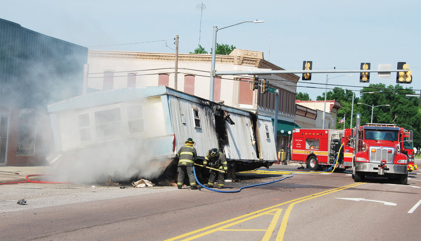 Firefighters from both Lexington and Purcell responded to a mobile home on fire in downtown Lexington last Sunday afternoon at 4:50 p.m. The mobile home had been dropped off and left basically at the corner of Main and Broadway due to it being on fire. No one was reported injured.