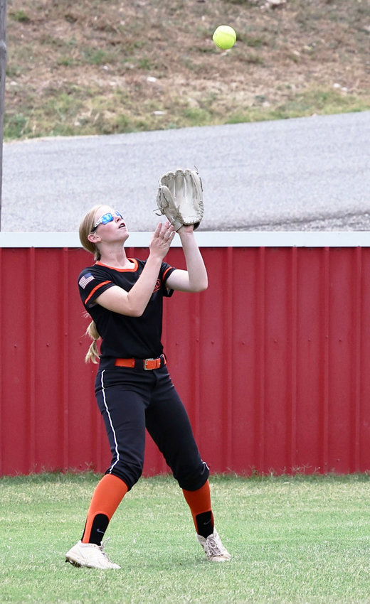 Lexington junior Abby Sample settles under a fly ball during the Bulldogs&rsquo; game against Washington in the Murray County Bash. Lexington was defeated 2-1.