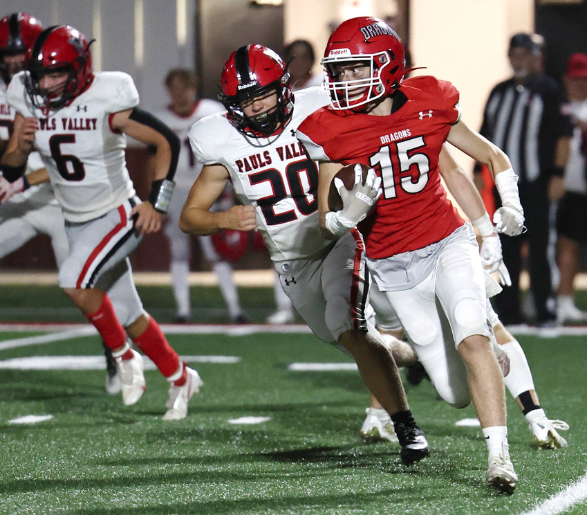 Purcell sophomore Devan Martin runs with the ball Friday night on Conger Field during Purcell&rsquo;s game against Pauls Valley. The Dragons lost 45-27.