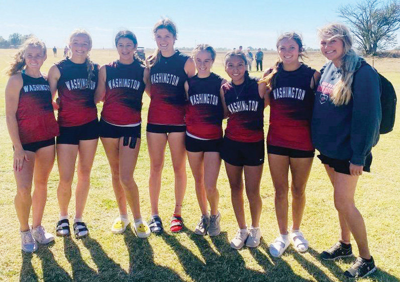 Washington&rsquo;s girls qualified for the State Cross Country Championships. From left are Rielyn Scheffe, Emersyn Massey, Addy Lanham, Addie Jackson, Bailey McAlister, Giselle Rodriguez, Kelby Beller and coach Dagan Wilcox.
