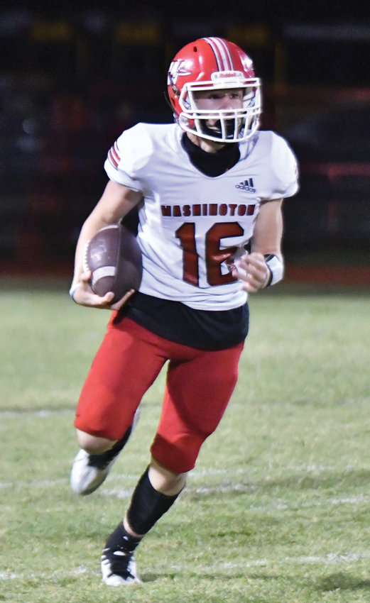 Washington freshman Kale Brakefield runs on a carry during the Warriors&rsquo; 55-6 win over Comanche last Friday. Washington squares off against Little Axe tonight (Thursday) after the homecoming coronation.