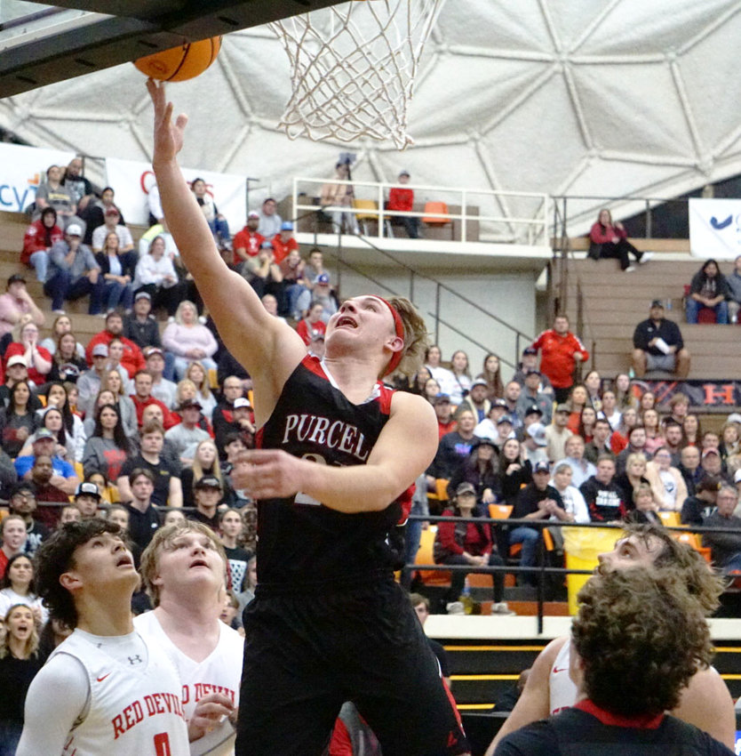 Purcell senior Hayden Ice shoots a layup against Prague In the Area tournament. The Dragons lost to the Red Devils 46-44. Ice scored 23 points in the game.