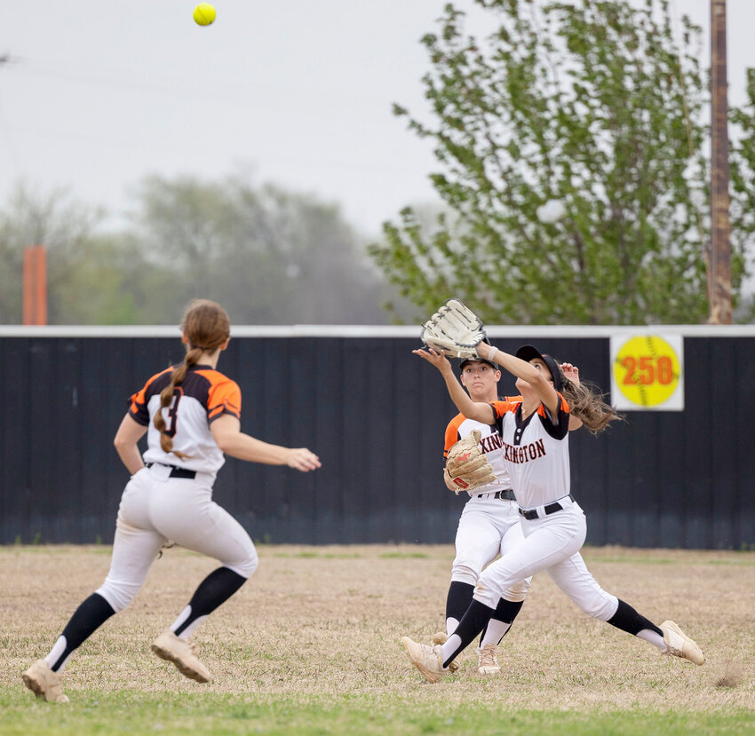 Lexington softball players Lexie Torres (24), Marisa Northrup (3) and Izzy Pack (6) converge on a ball in the outfield for an out. Lexington travels to Hobart today (Thursday) for the District tournament. Minco will also be in the tournament.
