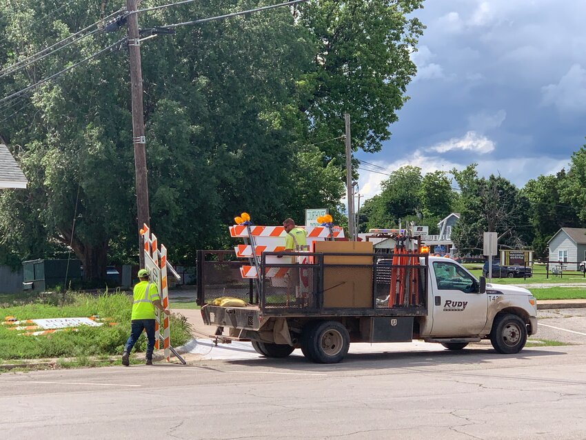 Crews moved signage and traffic control apparatus into place Friday in anticipation of the beginning of the Main StreetScape Project in downtown Purcell.