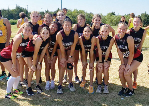 Washington&rsquo;s girls won the Titan Invitational Cross Country meet at Carl Albert. Rielyn Scheffe finished as the overall champion. Front row - Rielyn Scheffe, Jayden Wells, Giselle Rodriguez, Addy Lanham, Aubrey Grimes, Shiloh Phelps and Emersyn Massey. Back row - Hannah Hosley, Jay Calvert, Brinley Thomas, Addi Metcalf, Addi Jackson and Emma Flick.
