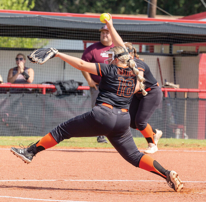 Lexington sophomore Hannah Garrett sends a pitch home against Blackwell during the Regional softball tournament. The Bulldogs lost 9-4 and 10-8, ending their season.