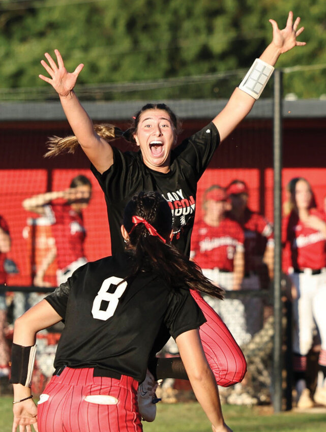 Purcell junior Ella Resendiz celebrates with fellow junior Hannah Whitaker (8) after retiring the final Plainview batter Thursday in the Super Regional softball tournament. Purcell will face off against Poteau in the State tournament in Shawnee at the Ballfields at FireLake today (Thursday).