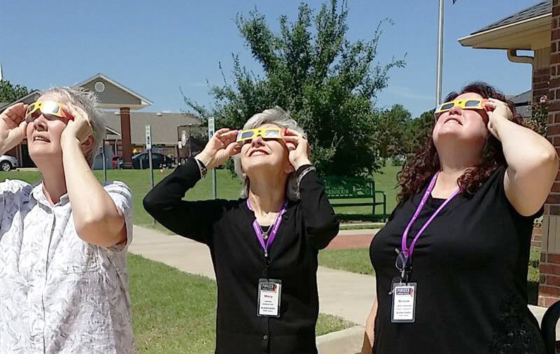 Blanchard Public Library staff view the August 2017 eclipse.