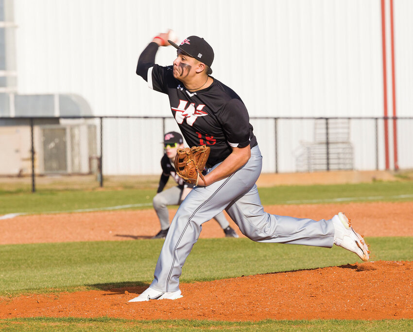Washington sophomore Jonathen Montoya delivers a pitch for the Warriors. Washington is scheduled to host Jones Friday.