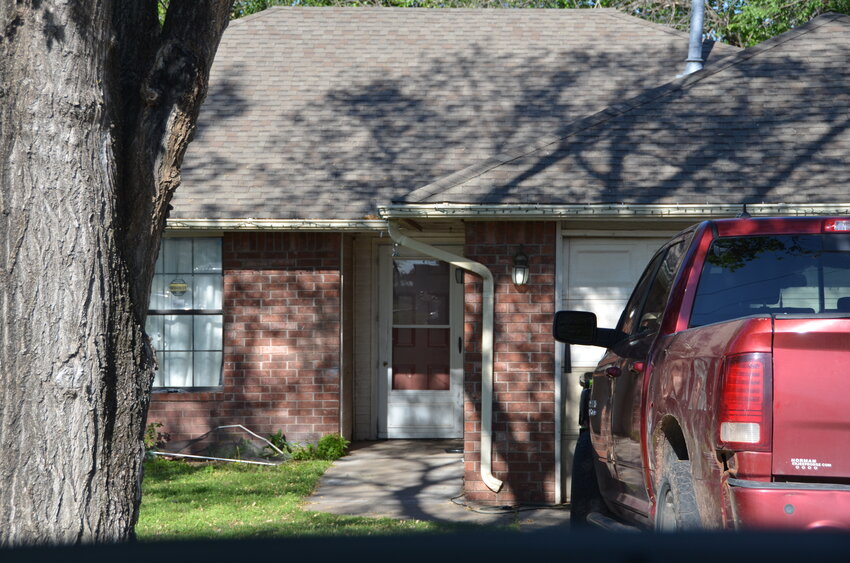 The front window and storm door of this residence at 1009 N. 8th Ave was the scene of a shooting that resulted in two arrests near midnight April 2.