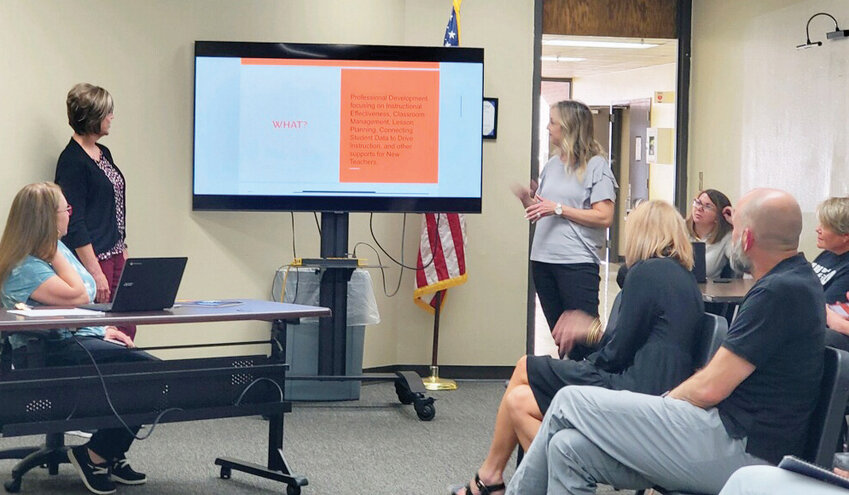 Purcell Elementary School teachers Amy Nemecek (left) and Kim Thompson gave a presentation to the Purcell Board of Education Monday on the school&rsquo;s Mentoring Monday Program. Mentoring Mondays pair experienced teachers with less experienced teachers to improve the classroom experience.