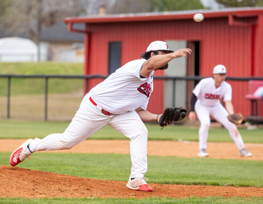 Purcell senior Bryce Blair throws downhill in recent Dragon baseball action. Blair and his Dragons finished runners-up in last week’s Heart of Oklahoma tournament after a 4-3 loss to CCS in the championship game.
