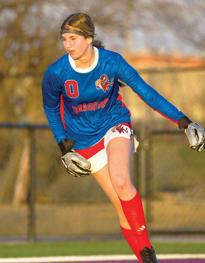 Dragon goalie Maria Payer works the ball for Purcell during a soccer match. The team, in the school’s first season, travel to Pathways Monday for a match at 5:30 p.m.