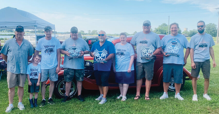 Winners and hosts for the Fourth Annual Jimmy Criswell Memorial Car Show fundraiser included, from left, Justin Taylor, Braxton Criswell, Aaron Criswell, Jarod Rogers, Tim Albert, Larrie Criswell, Mike McPherson, Corey Faust and Brandon Criswell.