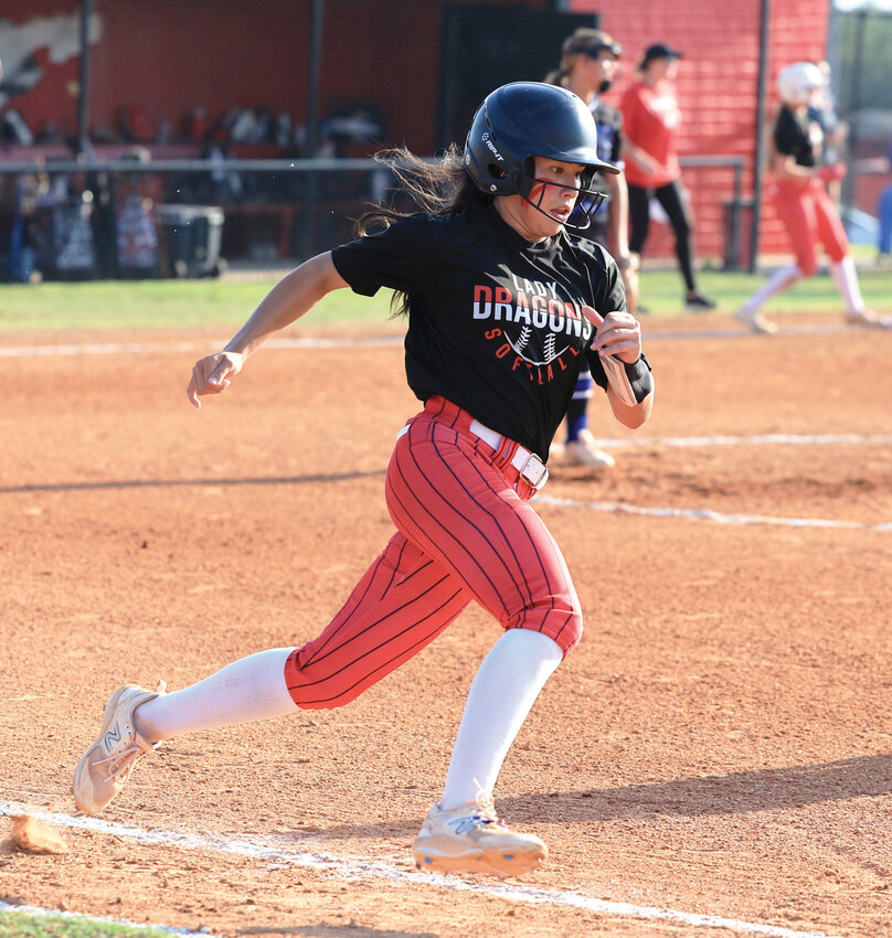 Purcell junior KK Vazquez motors around the bases for a triple during Purcell&rsquo;s season-opening 12-4 win over Bridge Creek. Vazquez drove in two batters with the hit.