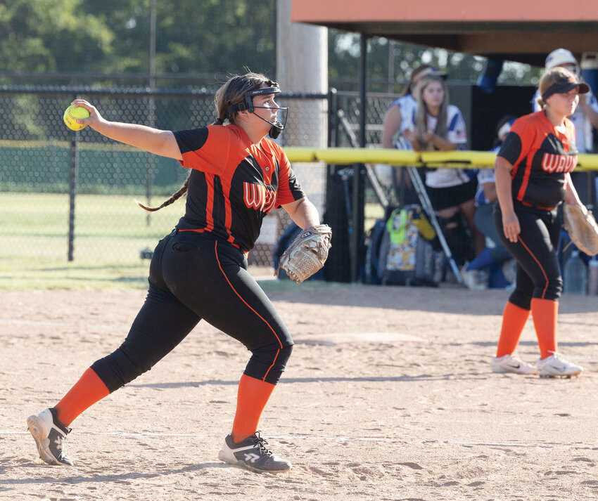 Wayne freshman Maddie Moreno delivers a pitch against Central High School during the Bulldogs&rsquo; 12-11 win. Moreno struck out four batters in the game.