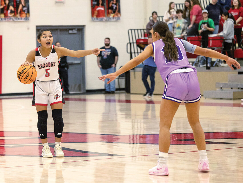 Purcell senior Kenna Esparza barks out calls during the Dragons&rsquo; game against CCS. Purcell was defeated 47-40. Esparza scored five points.