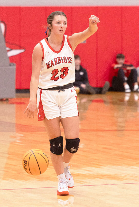Washington junior Kelby Beller sets up the Warrior offense. The No. 1 ranked Warriors pick back up December 26 with the prestigious Bertha Frank Teague Mid-America Classic at East Central University where they play Duncan.