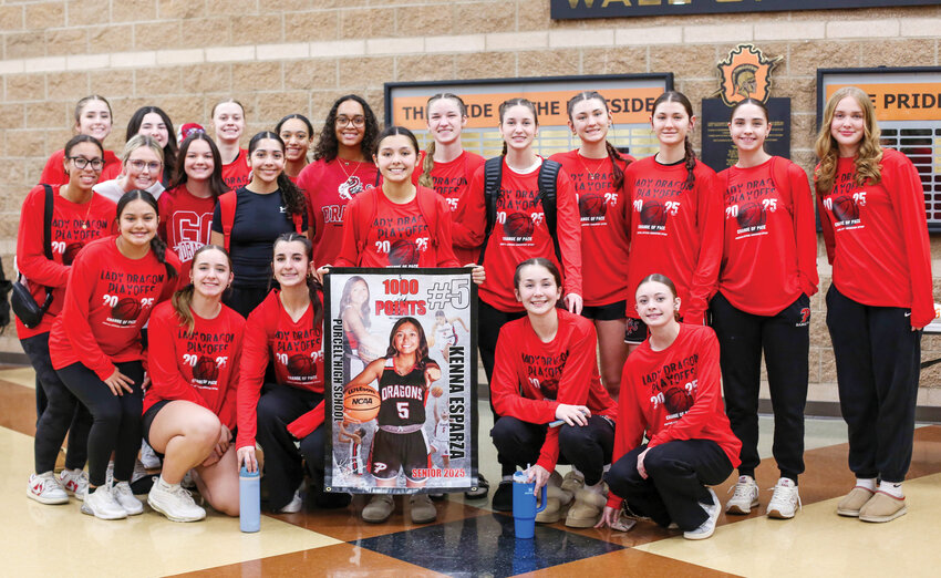 Purcell senior Kenna Esparza, center, went over the 1,000 point mark for her career during the Dragons&rsquo; game against Douglass on Saturday. Esparza scored 19 points in the contest.