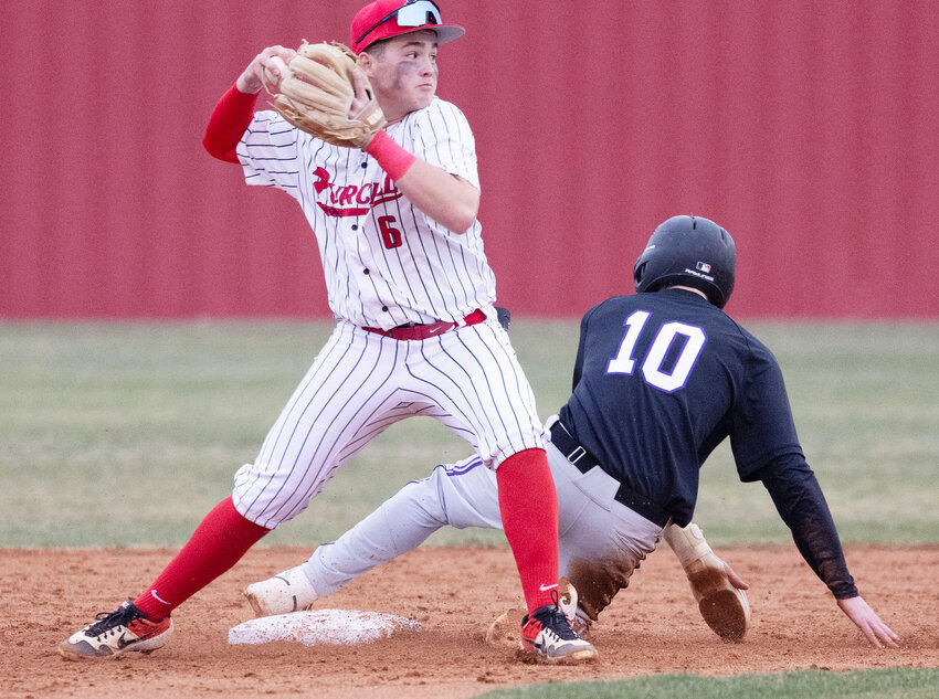 Purcell sophomore Kash Knowles attempts a double play during the Dragons game against Chickasha. Purcell was defeated 3-1.