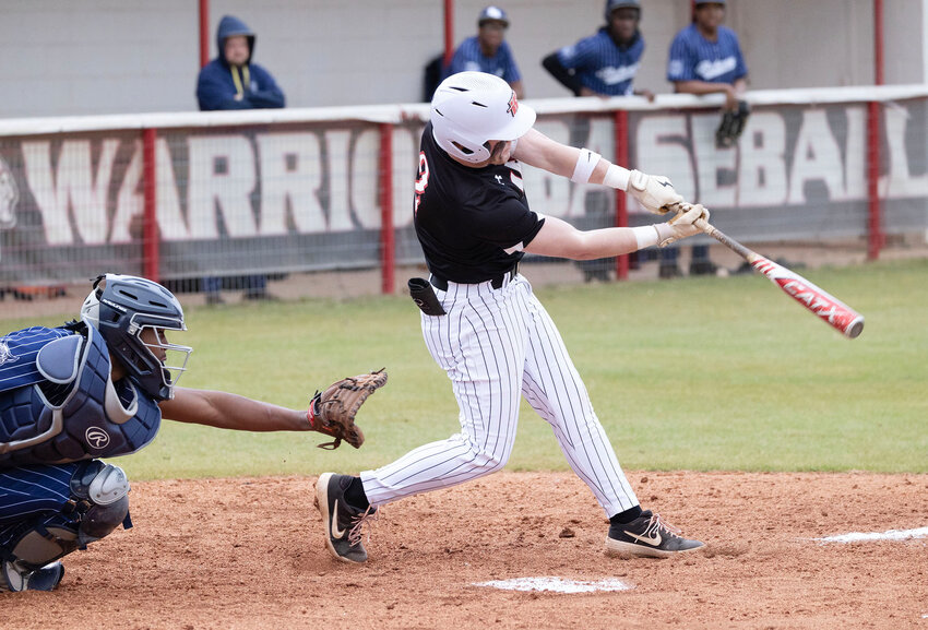 Washington junior Liam Keltner gets a hit against Star Spencer during the Warriors’ District games against the Bobcats. Washington won two games, 23-0 and 21-1.