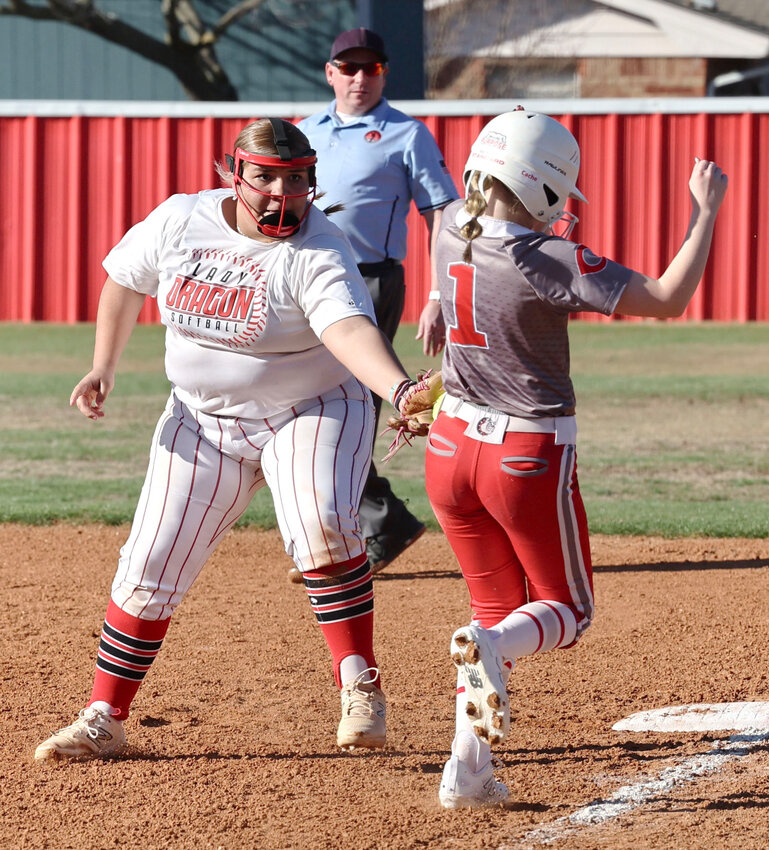 Purcell freshman Miaca Martinez tags out a Cache base runner during the Dragons’ 9-8 win Monday. Martinez was also 2-3 at the plate with an RBI in the game.
