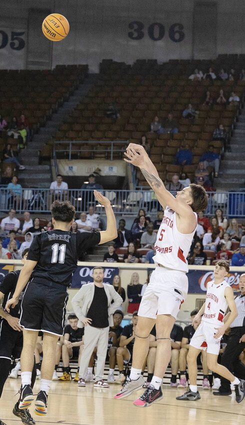 Washington senior Gavin Cortez pulls up for a shot in the State finals against Crooked Oak. The Warriors were defeated 58-50. Cortez scored five points.