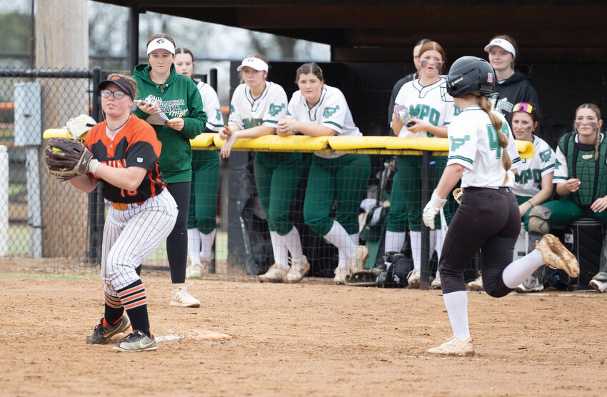 Wayne junior Lily Whitaker catches a ball for an out at first base during the Bulldogs&rsquo; game against AmPo. Despite Whitaker&rsquo;s five-RBI day, Wayne was defeated 8-7.