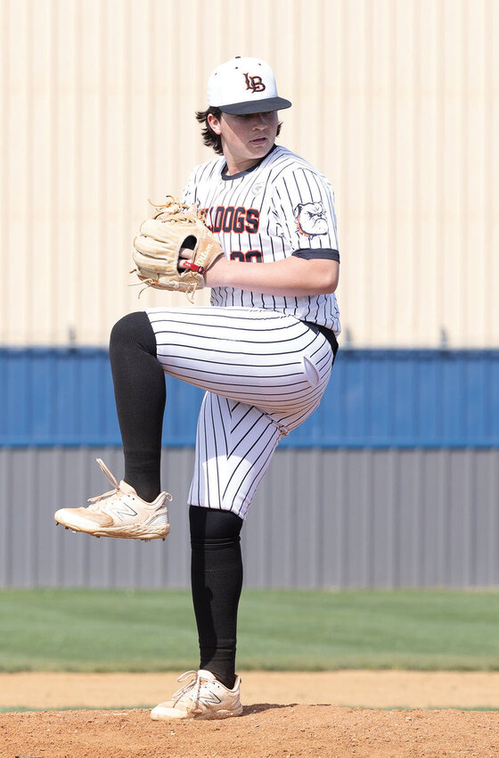 Lexington junior Colby Haynes winds up for his pitch on the mound in recent baseball action. Haynes and the Bulldogs beat Ringling 11-3 in the consolation game of The Jake wood bat tournament. He had four strikeouts in the win.