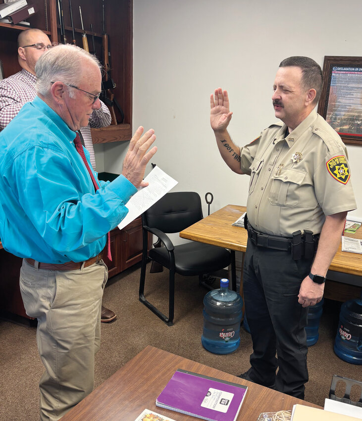 McClain County Sheriff Landy Offolter recently swore in new county deputy Anthony Porter in Offolter’s office at the courthouse.