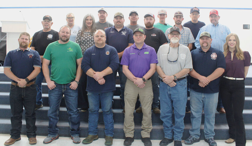 REC recognized the 24 rural fire departments within its service area with a banquet. Pictured (from left,bottom row) Billy Simpson, Washington; Jordan Powell, Payne; Jesse Holman, Lindsay; Jamey Meadow, Elmore City; Richard McCarty, Rush Creek; James Warren, Paoli and State Senator Kendal Sacchieri. (middle row) Earl Henderson, Doyle;  State Rep. Cindy Roe; Jesse Bearce, Farwell; Austin Smith, Bailey; Troy Patterson, Cox City and Brent Balentine, Pernell. (top) Kathy Leveridge, Wayne; Brad England, Dibble; Jeremy Caldwell, Maysville; Braxton Stringfellow, Acme and Allan Hensley, Katie.