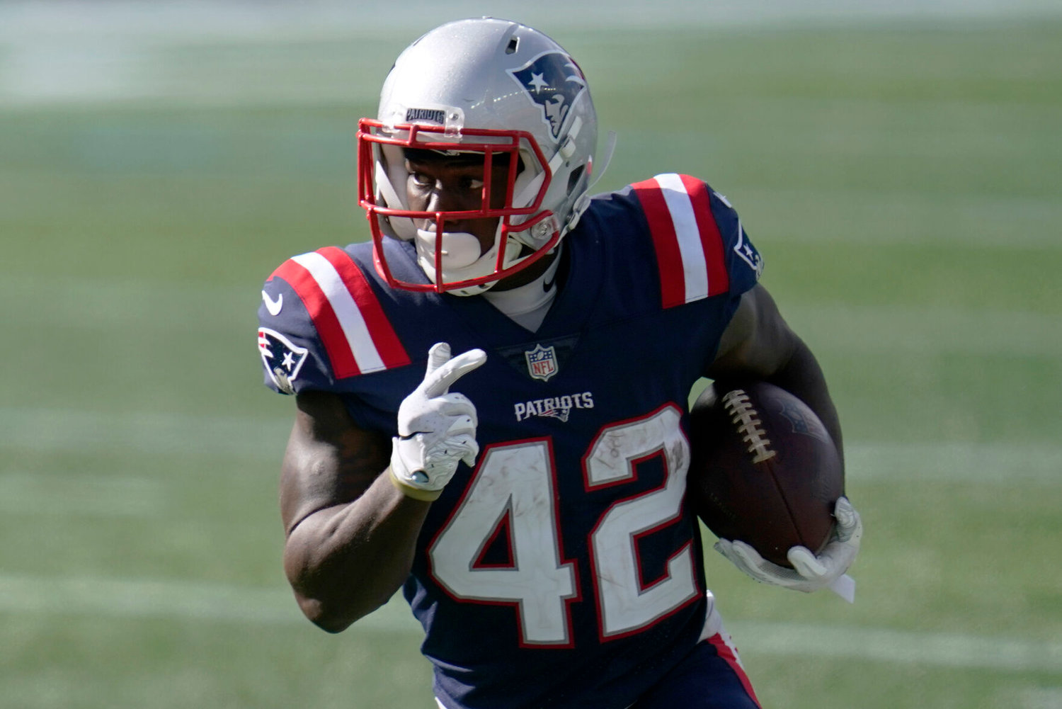 Tuesday, August 10, 2021: New England Patriots running back J.J. Taylor  (42) carries the ball at