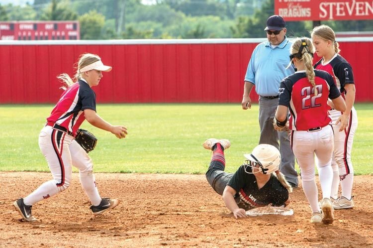 Kinley Croslin gets back to second base ahead of the tag during Purcell’s 2-1 win over Pauls Valley.