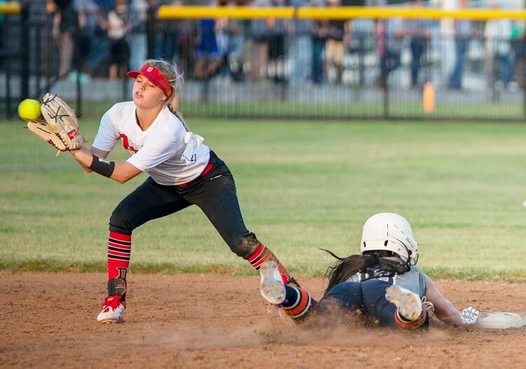 Kamryn Moss slides into second in the Lady Bulldogs’ win over Duncan Tuesday. Moss was 2-3 at the plate in the 2-0 win over the Lady Demons.