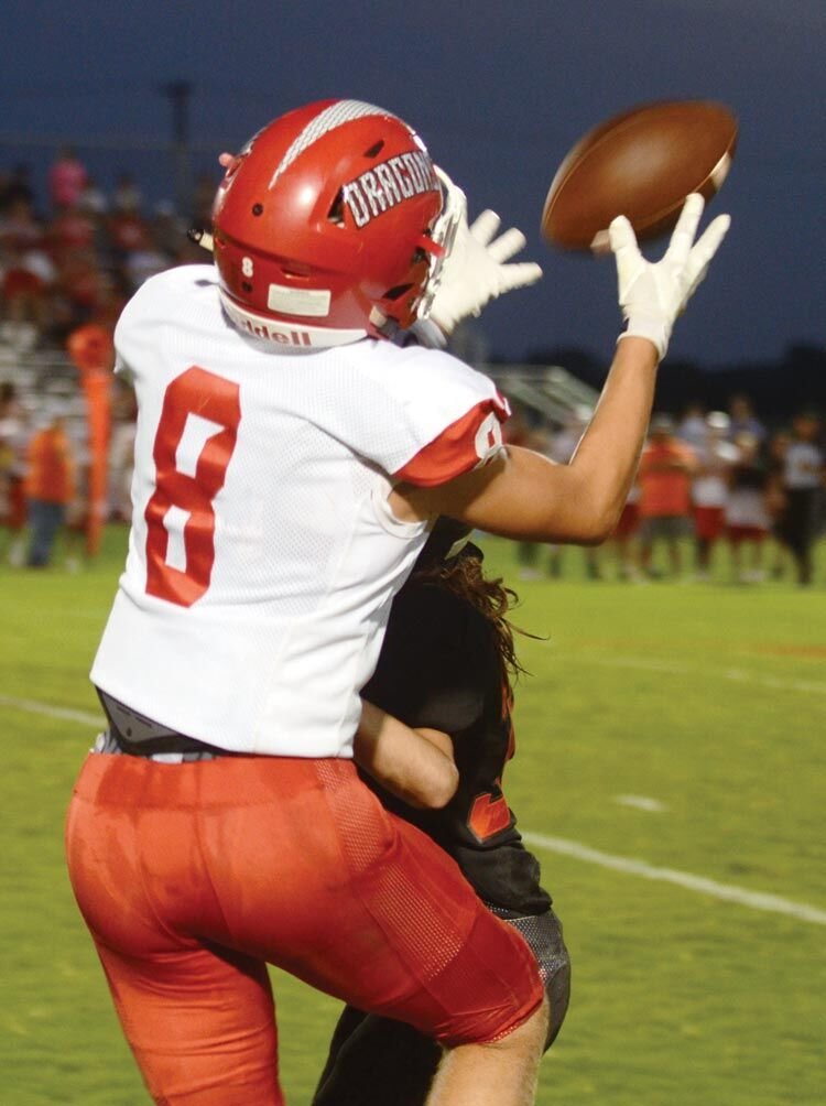 Brody Galyean makes tremendous catch during Purcell’s 35-28 win at Lindsay Friday night. Galyean led the the Dragon receivers, catching seven passes for 85 yards.