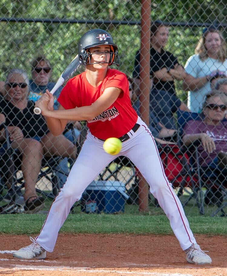 Kinzie Schultz takes a pitch during an at bat. The Washington Warriors are 17-1 this season and play in the Silo tournament beginning today (Thursday).
