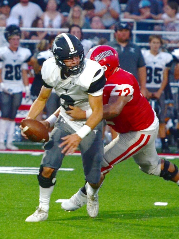 Jaysen Shea sacks the Lone Grove quarterback Friday night at Conger Field. Purcell lost 41-40 in overtime.