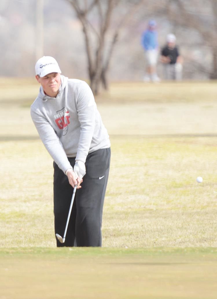 Bryce Tuck looks to save par during the Purcell Invitational Golf Tournament at Brent Bruehl Memorial Golf Course. The Dragon one man shot 91 in difficult conditions.