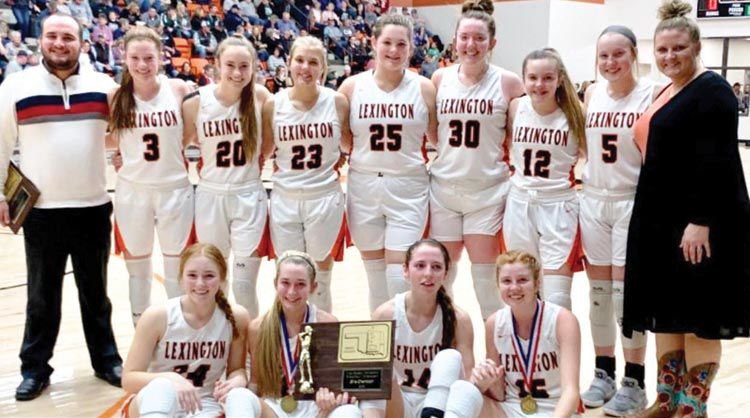 The Lexington Lady Bulldogs took first place in the Grady County Tournament last weekend. Pictured are in front, from left, Anna Sample, Amanda Graddy, Emilee Jenks and Lauren Beason. And, in back, from left, are head coach Derek Clark, Rylee Beason, Janelle Winterton, Harley Salisbury, Maddison Manuel, Jaci Idlett, Leslie Barber Carol Lair and Assistant Coach Ashton McMahan.