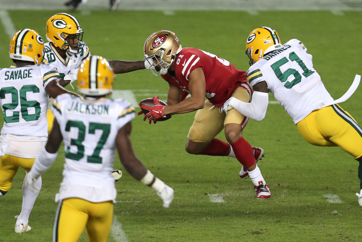 San Francisco 49ers tight end Jordan Reed wears a logo for Salute