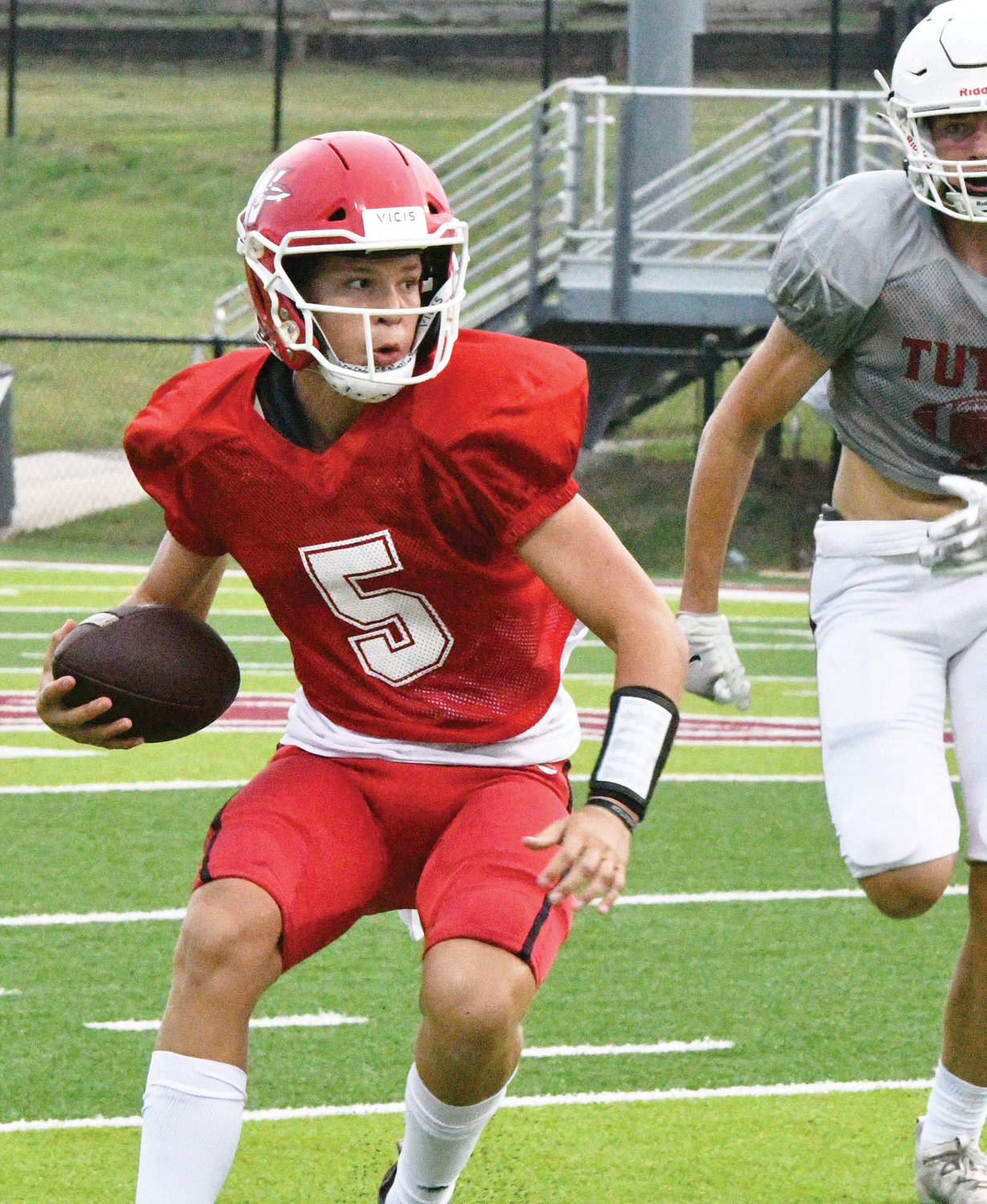 Washington junior Jaxon Hendrix runs with the ball during the Warriors’ scrimmage against Tuttle on Thursday. Washington begins the regular season Friday night at home against Pawnee. Kickoff is set for 7 p.m.