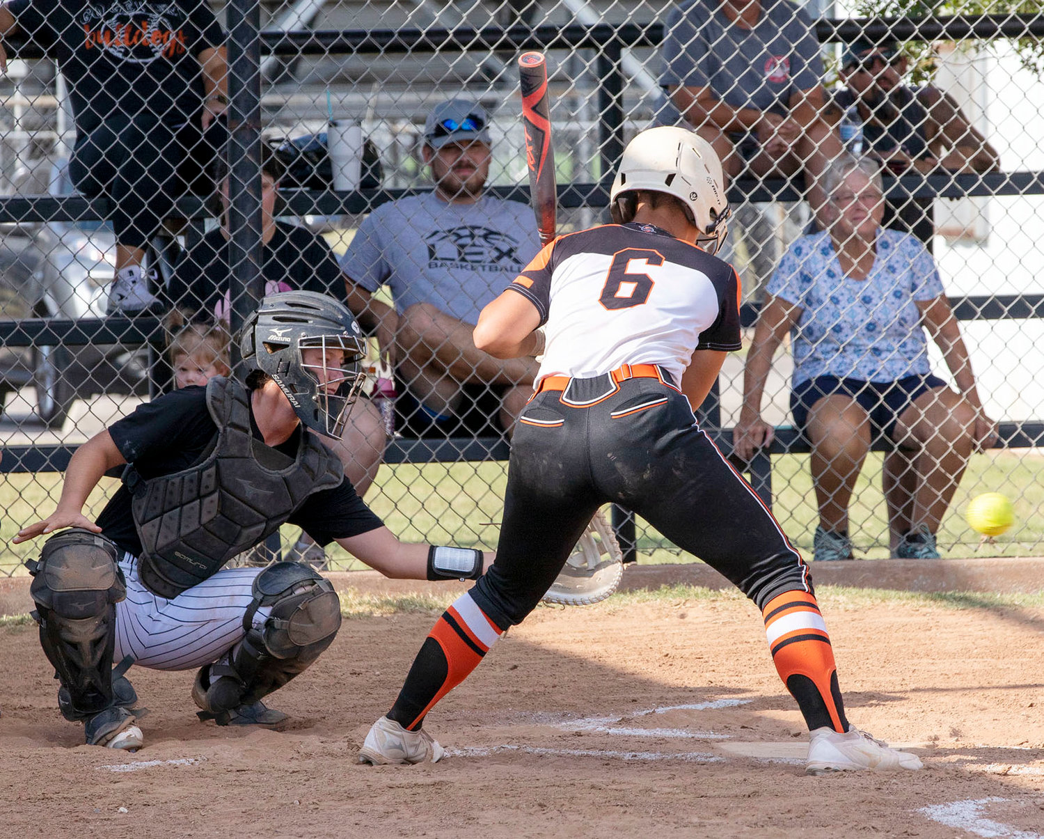 Lexington junior Izzy Pack takes a pitch during Lexington’s 12-1 win over Meeker. Pack had three RBIs in the game.