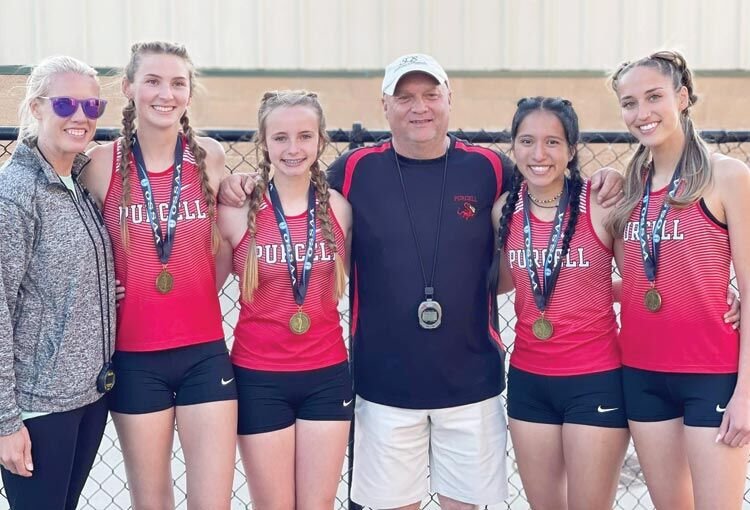 The Purcell 1600 meter relay team finished fifth at the State track meet in Catoosa Friday. The team ran a time of 4:16.55. Pictured are, from left, coach Mandy Clay, Kora Keith, Gracie Pruitt, coach Greg Dillard, Liz Caralampio and Tate Quintero.